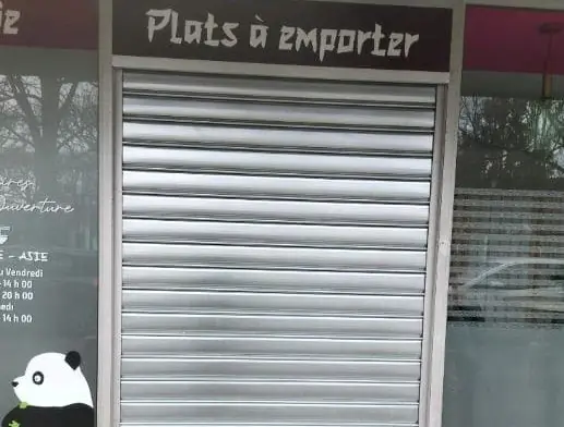 Remplacement d'un rideau métallique