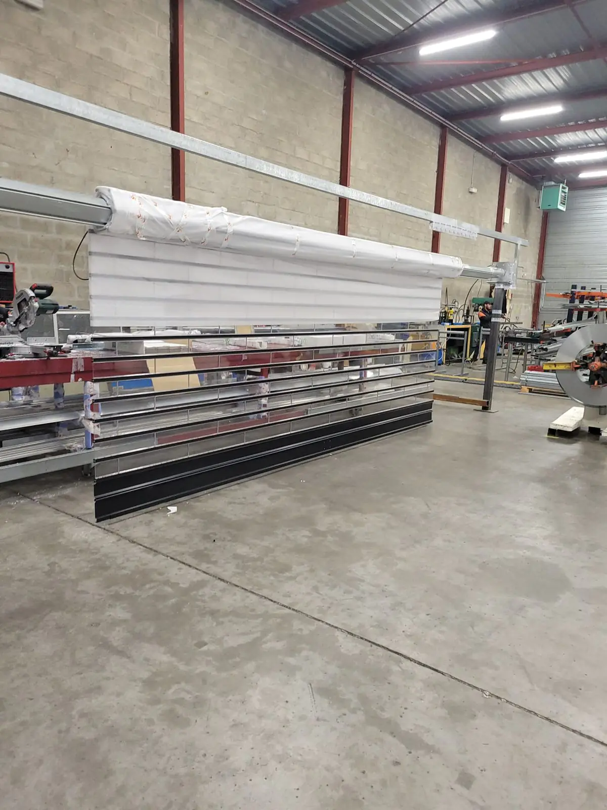 Conception et usinage en atelier rideau métallique